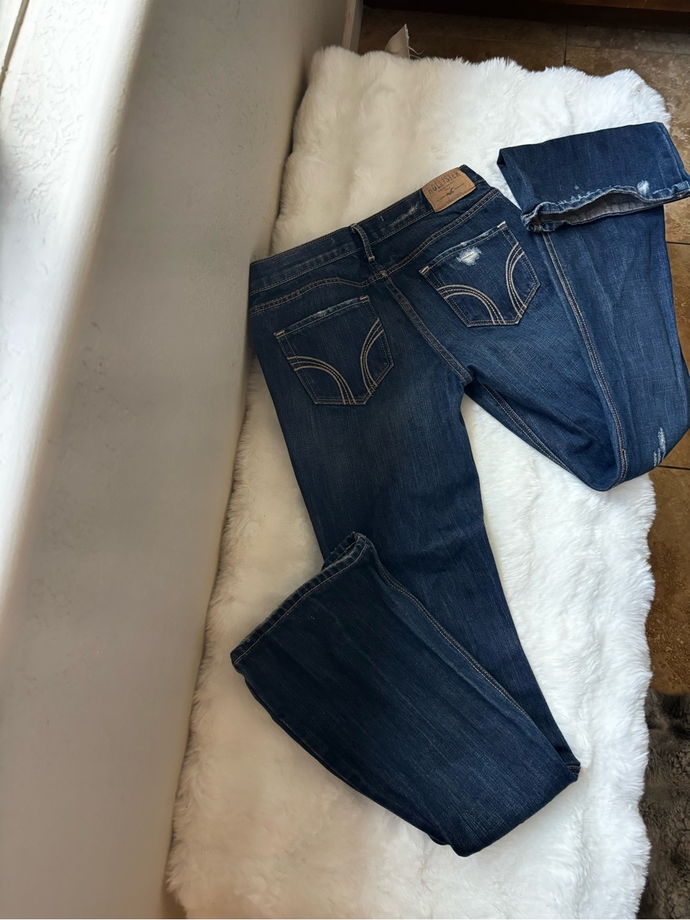 Hollister Dark Blue Bootcut Jeans with Subtle Distress